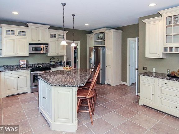 Large island with extra fridge and seating