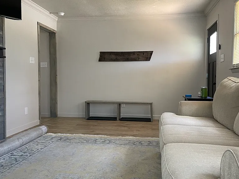 View of side entry from living room (kitchen to opening on left)