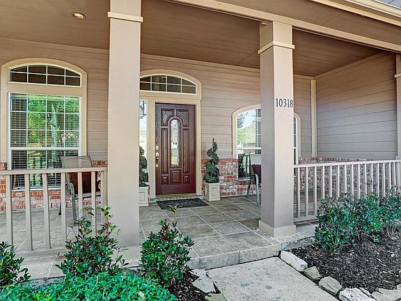 The covered patio at the front of the home provides shade from the elements when time is spent here.