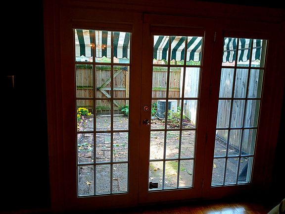 French doors to patio center opening has sliding screen