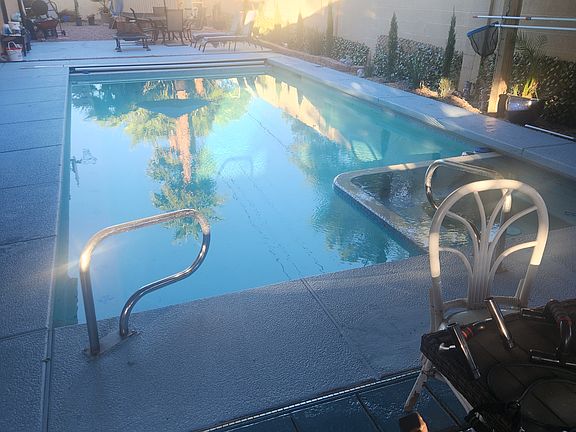 Pool area and jacuzzi.