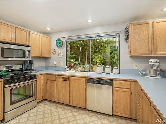 Gas range-all appliances are newer whirlpool package and are all included. Cabinets have pull out drawers to make organizing a breeze. Peninsula has tons of storage for kitchen on this side and just wait until you see the built in from the secondary living space. Large pantry next to large size fridge