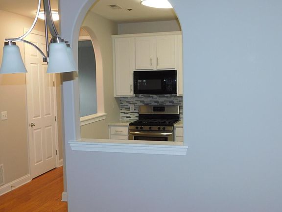 Stainless Appliances, Glass Backsplash