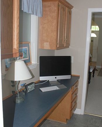 Built in desk at rear entrance