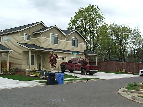 Building from southeast. North unit (on right) is available.