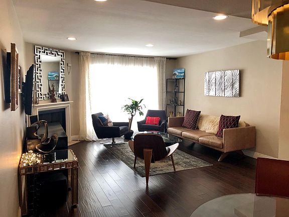 Living room with gas fireplace.