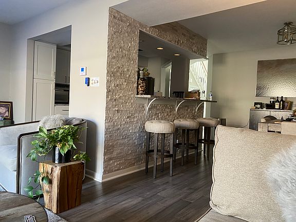 Granite top tiled exterior eating bar.