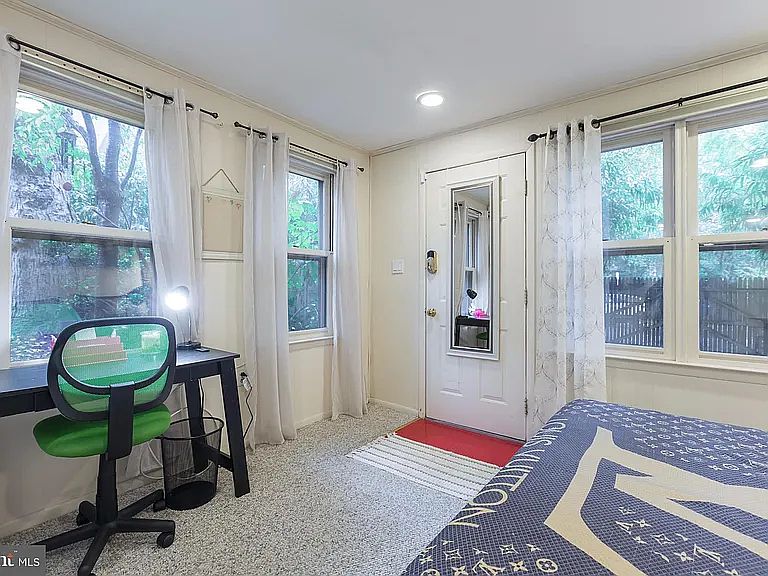 entrance area -- it's currently set up as an office/ dining area.
