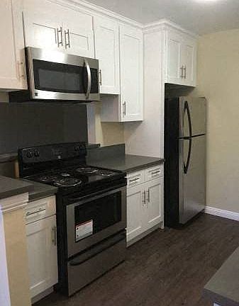 Completely Renovated with new cabinets, quartz counters and stainless steel appliances