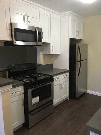 Completely Renovated with new cabinets, quartz counters and stainless steel appliances