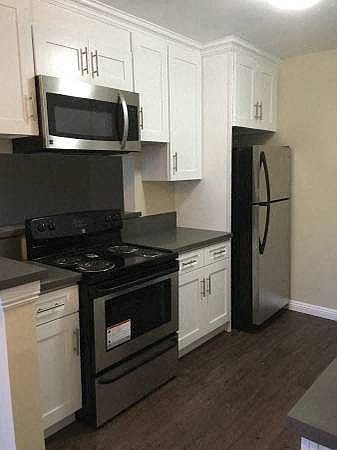 Completely Renovated with new cabinets, quartz counters and stainless steel appliances