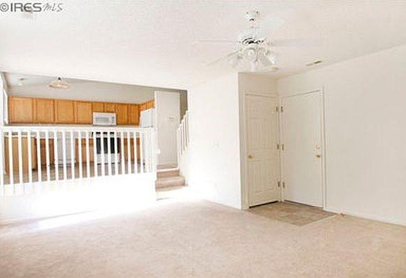 Lower sitting area off garage and kitchen