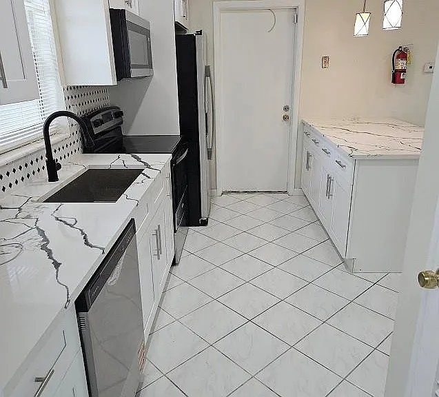 6380 NW 25th Ct — Photo 12