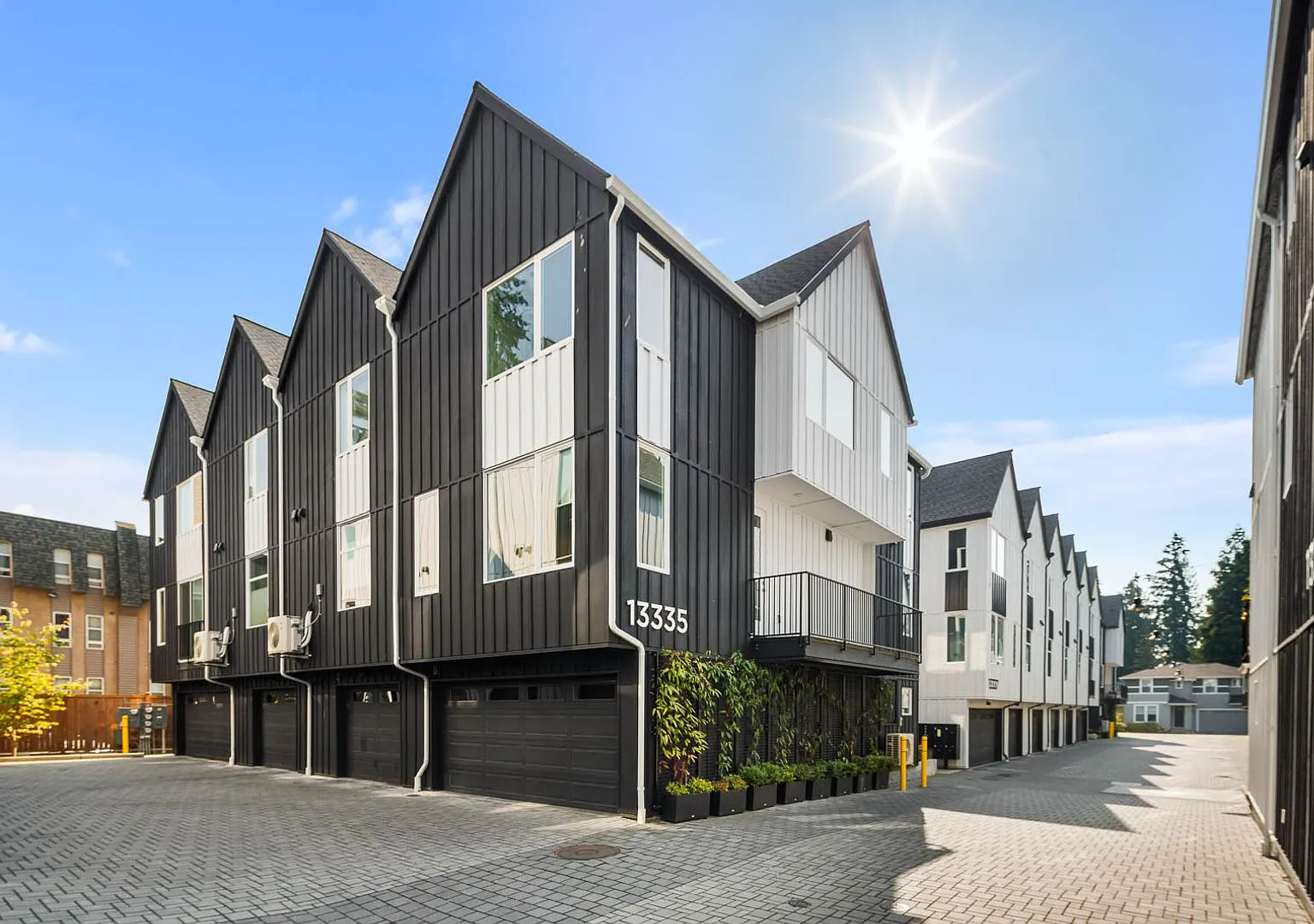 Contemporary Townhome with Attached 2-Car Garage — Photo 1