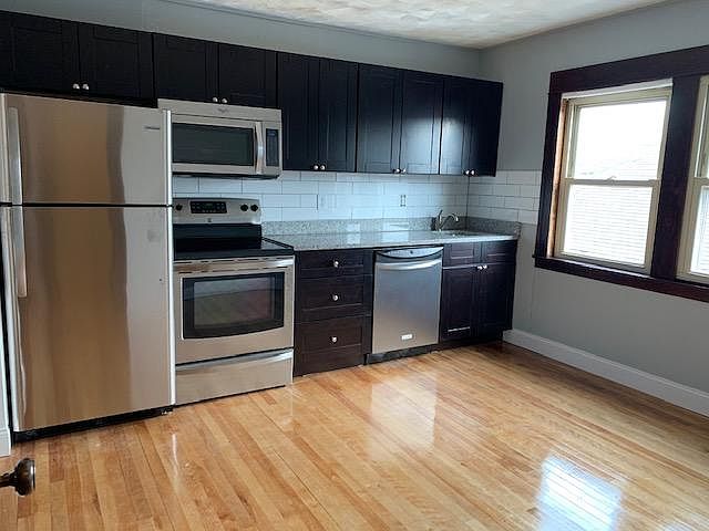 Updated new stainless steel appliances and granite countertop.