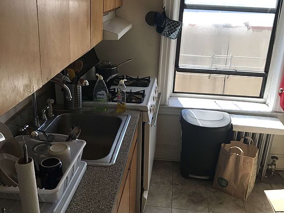 2nd image of 3051 48th St APT 3a