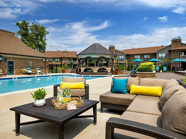 Resort-style pool and expansive sundeck with lounge seating