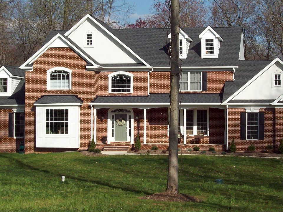 Gorgeous Custom Home on 5 wooded acres