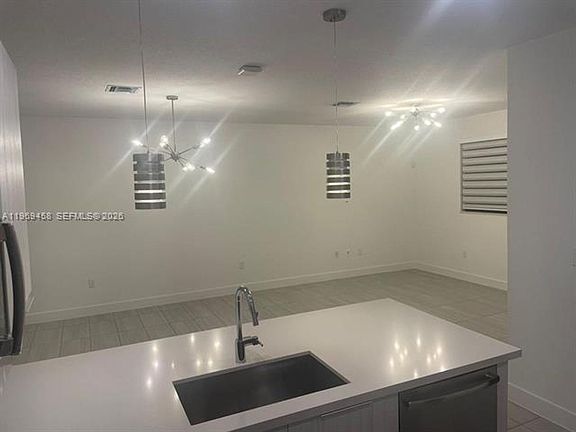 3rd image of 10445 NW 81st Ter #Townhouse 10045