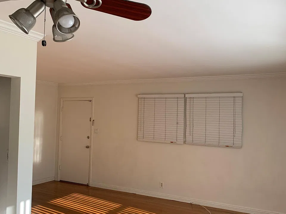 Dining area with a fan.