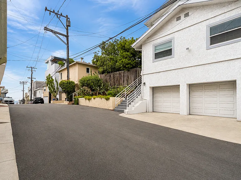 Garage parking with low-traffic alley access