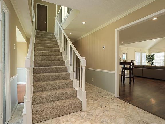 Formal Entry opens to the formal Living/Dining. New carpet installed Oct. 2019
