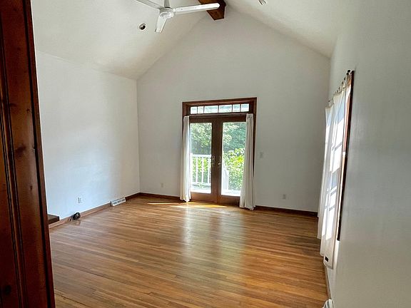 Living room with doors to deck