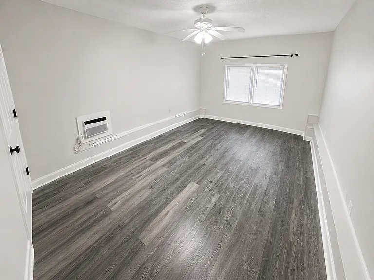 Flexible 4th BR or Private Guest Suite complete with its own private entrance and access to a full bathroom. Use as a suite, second family room, home office, fitness space, or media room, this room offers flexibility while providing added privacy.