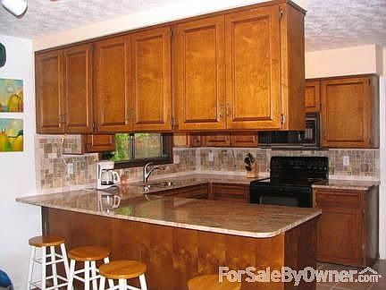 Kitchen
						:
						Breakfast bar w/new granite counter tops