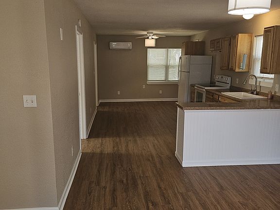 Walking in the front door. Flex room to the left. Living to the right.