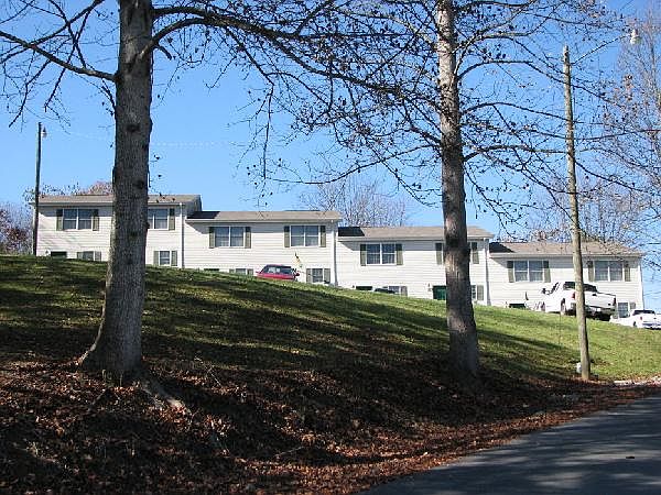 Small apartment conplex overlooking the mountains but shopping is close by.