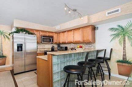 Large Level One Waterfront Living Room
						:
						NOTE: Recently changed to bamboo wood floors seen in pictures 53-56