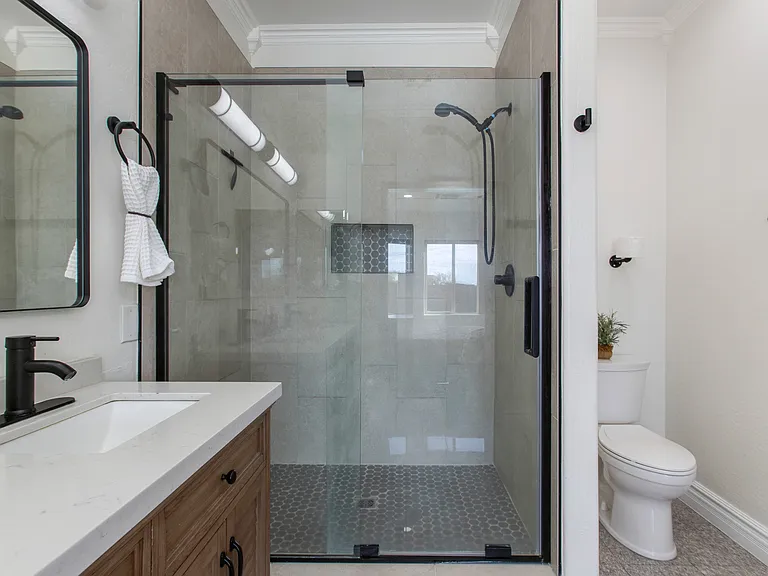 Tiled Shower and Glass Sliding Door
Squeegee Glass and Floor