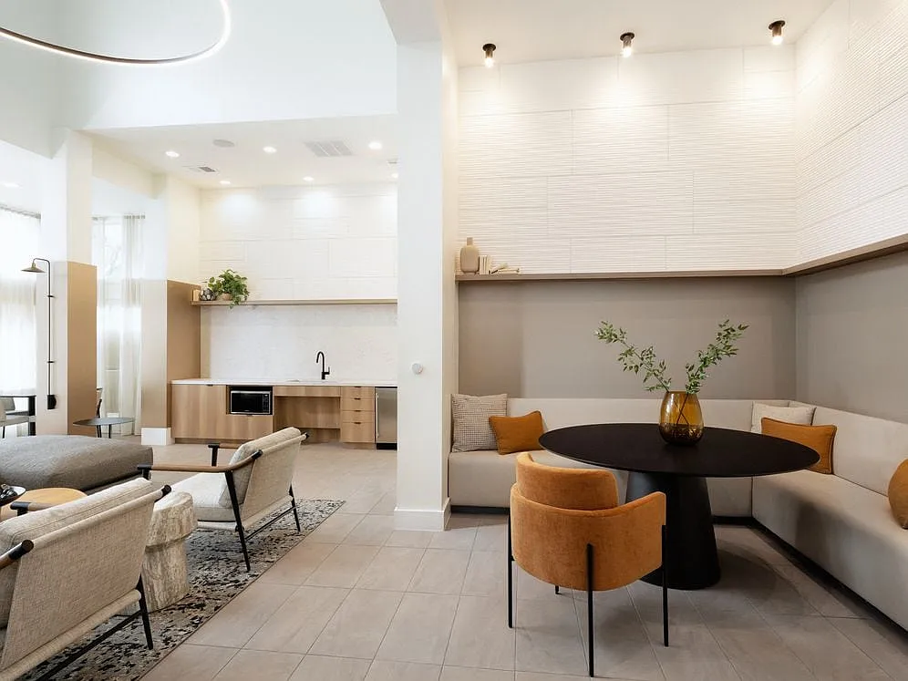 Resident lounge with kitchenette and seating - Avalon Fairway Hills-Meadows
