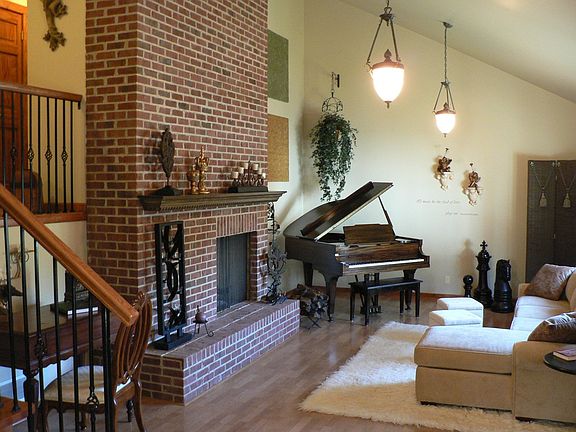 Living Room with Woodburning Fireplace
