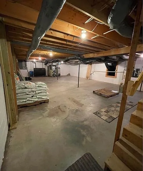 Basement with connections to craw space under family room, washer and dryer in basement