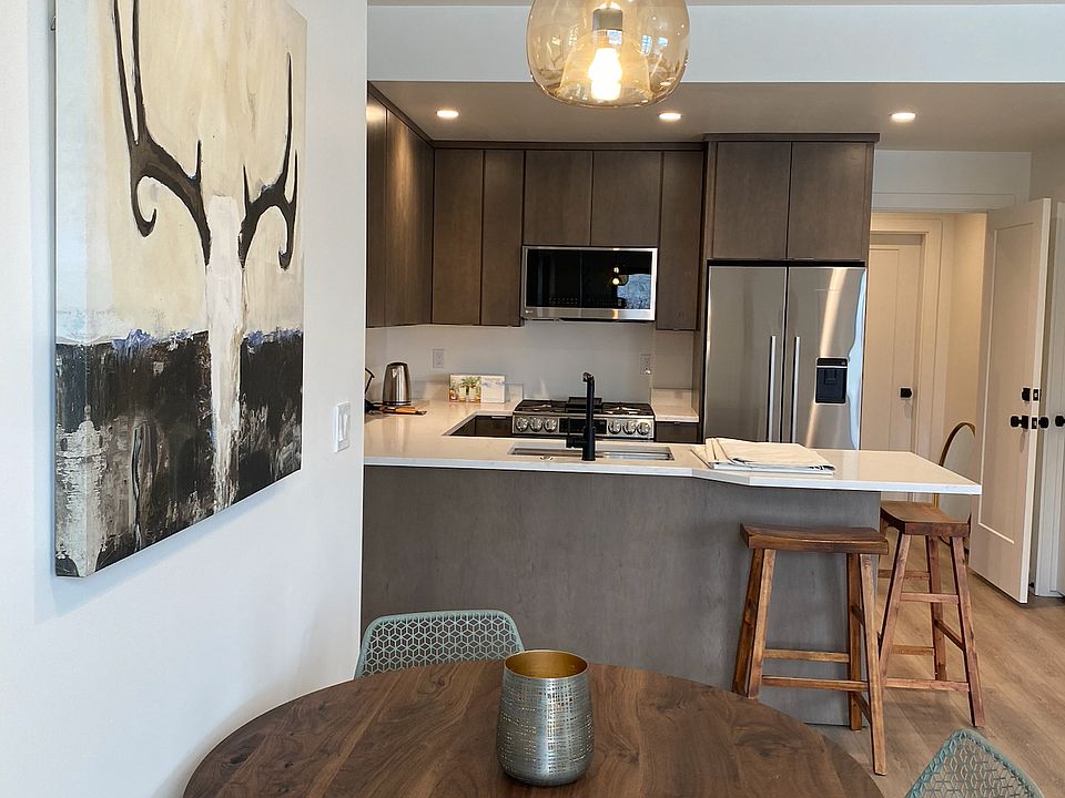 Dining table toward kitchen.