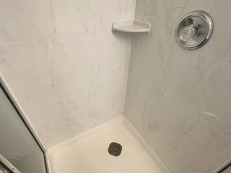 Shower in top floor attached bath.