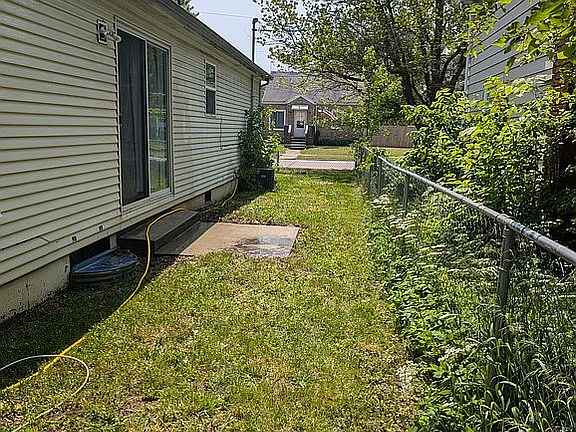 Fenced in back yard area