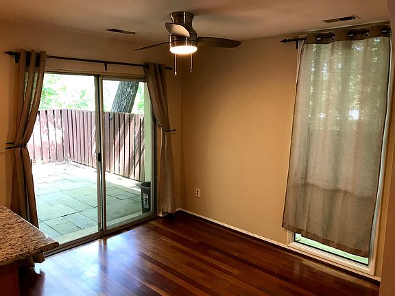 Dining area/room connects to fenced in patio (w/walkway to front patio)