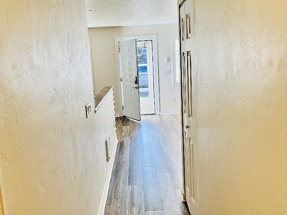 Hallway leading to the front door.