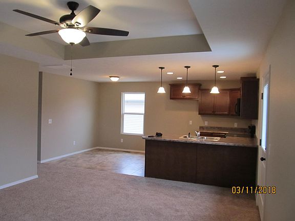 Living room to kitchen. Very open.