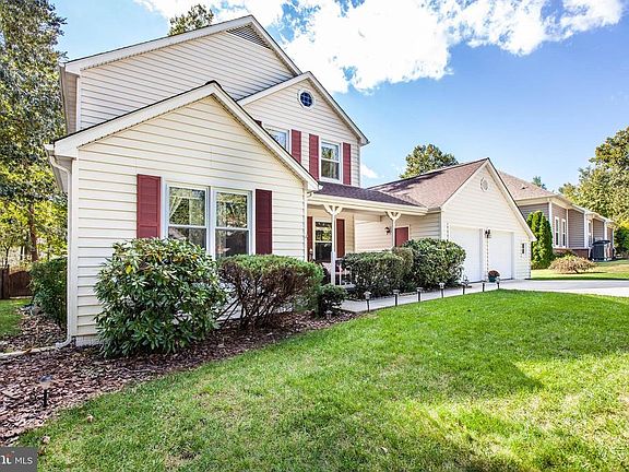 Lush lawn and sun-drenched front yard