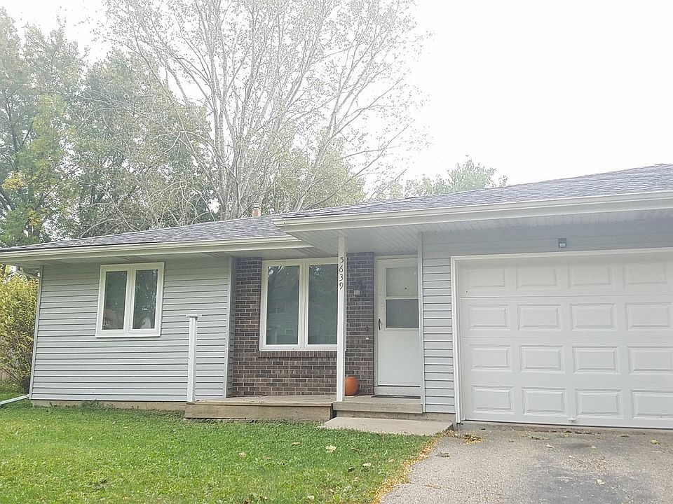 Motion sensor lights, keypad entry into garage (also comes with two remotes), front porch.