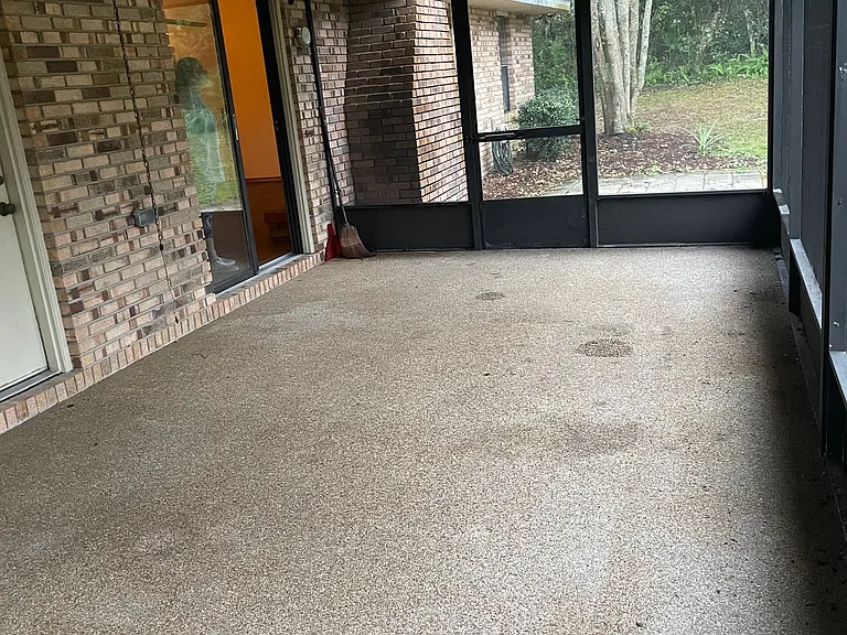 Covered Screen porch - slider to Living room and door to back yard.