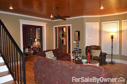 Living Room
						:
						View from staircase. Plantation shutters throughout.