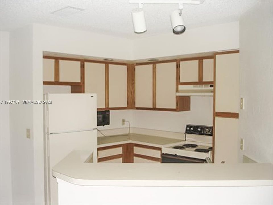 2nd image of 3300 Pinewalk Dr N APT 1915