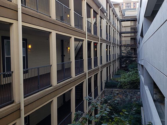 Hallway to Units (left) and Secure Garage (right)