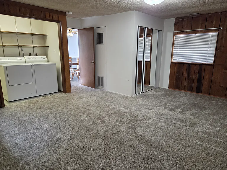 Bedroom #4 with laundry room