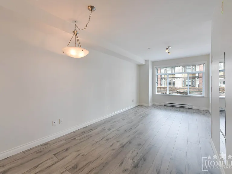 5650 201a St #218 — Photo 7